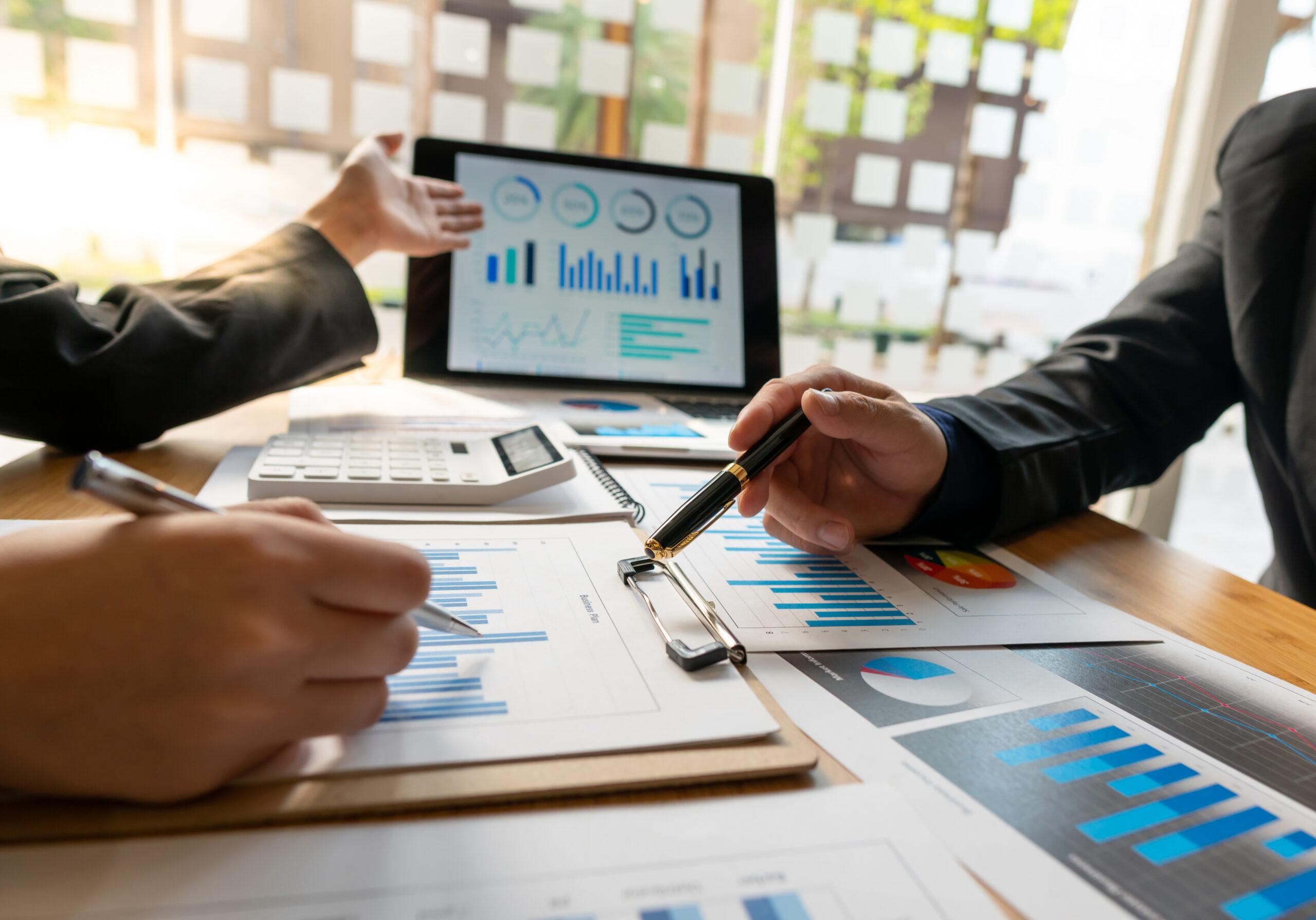 Healthcare leaders reviewing data to guide real estate decisions